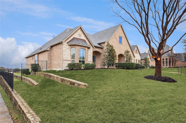 view of front of home with a front yard