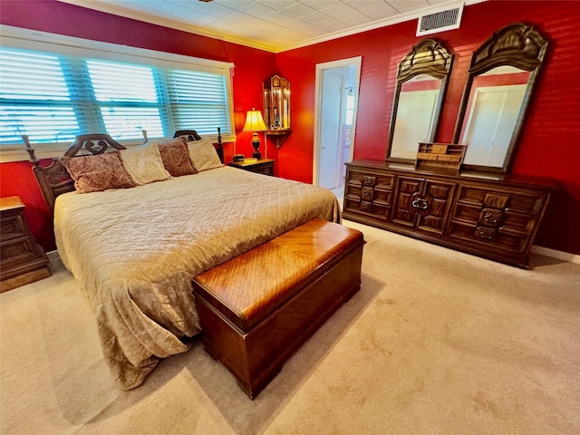 carpeted bedroom with crown molding