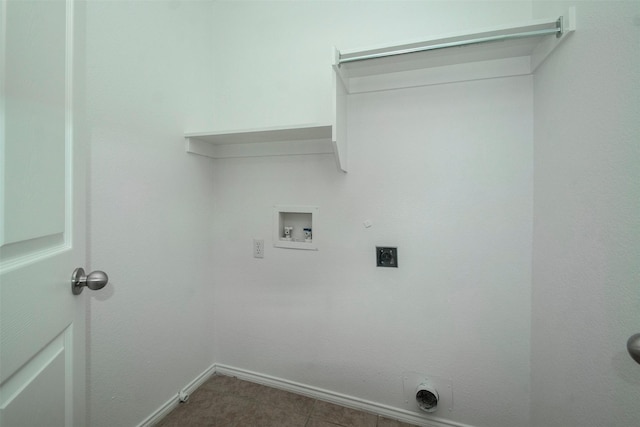 laundry area with hookup for a gas dryer, hookup for a washing machine, and electric dryer hookup