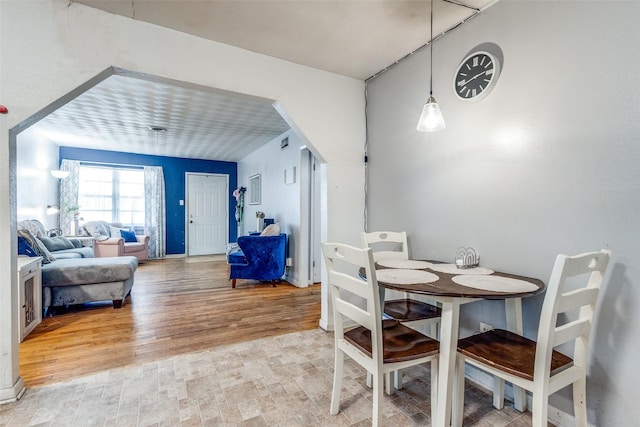 dining area with hardwood / wood-style flooring