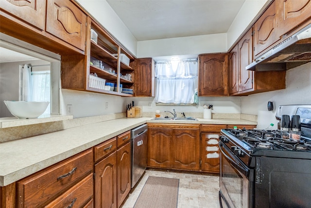 kitchen featuring stainless steel dishwasher, black range with gas stovetop, and sink