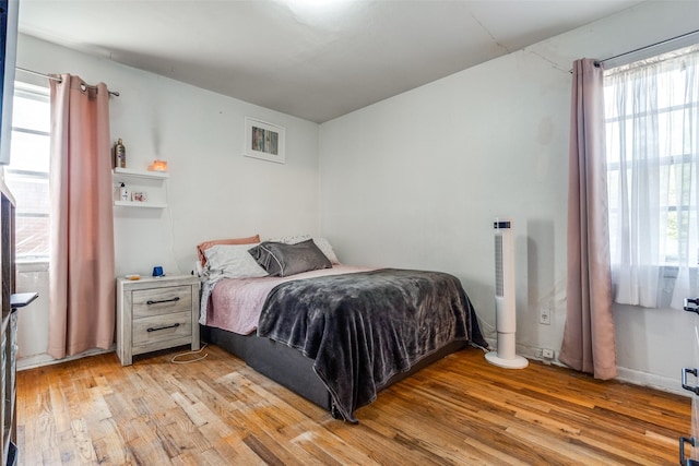 bedroom featuring light wood-type flooring