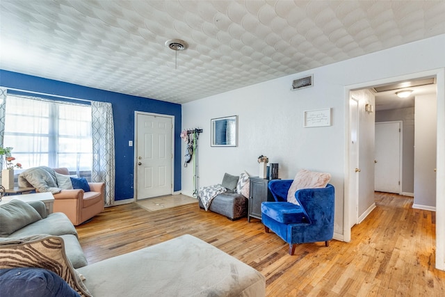 living room featuring light hardwood / wood-style floors