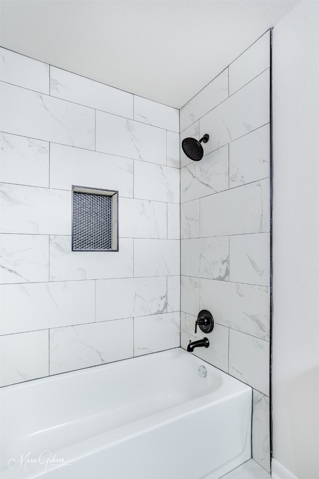 full bathroom featuring tub / shower combination