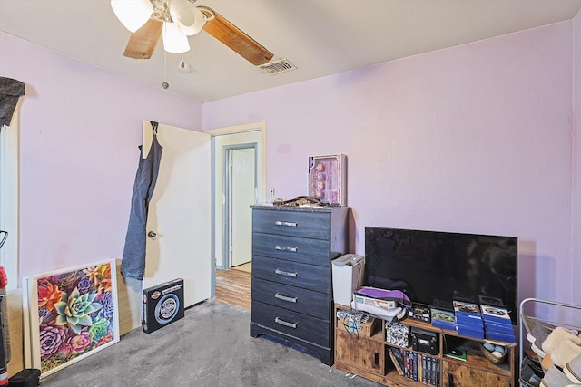 bedroom featuring concrete flooring and ceiling fan