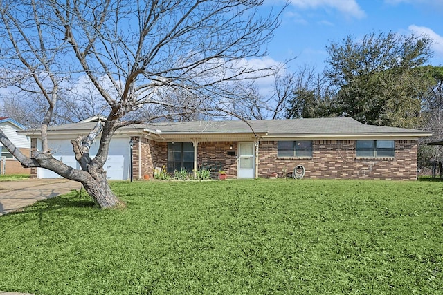 ranch-style home with a front lawn and a garage