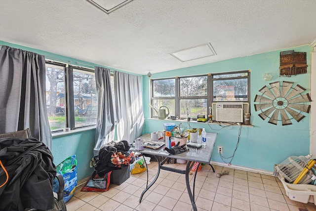 sunroom / solarium featuring cooling unit