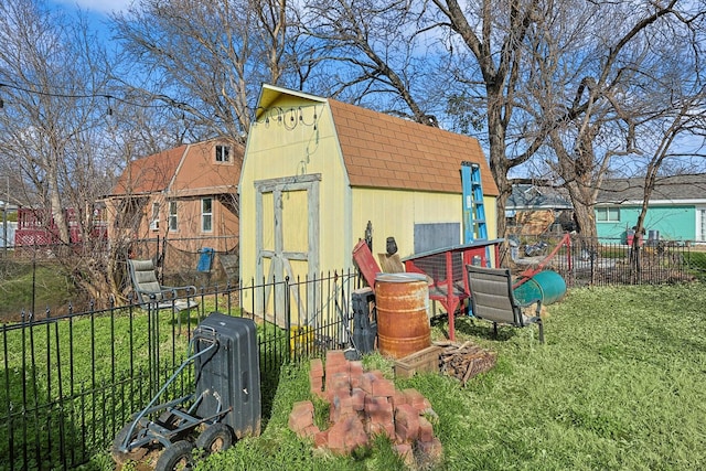 view of outbuilding featuring a yard