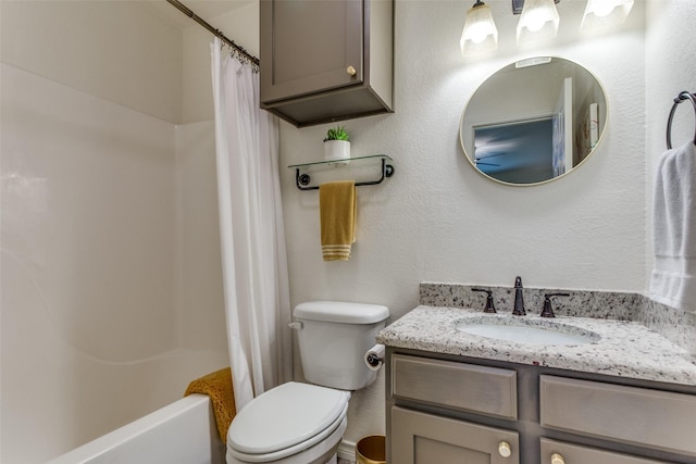 full bathroom featuring vanity, toilet, and shower / tub combo with curtain