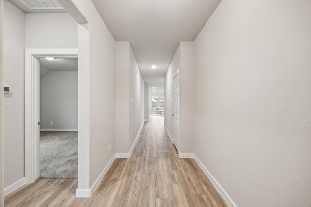 hallway featuring light hardwood / wood-style floors