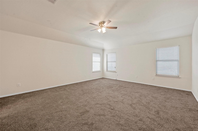 carpeted empty room with ceiling fan