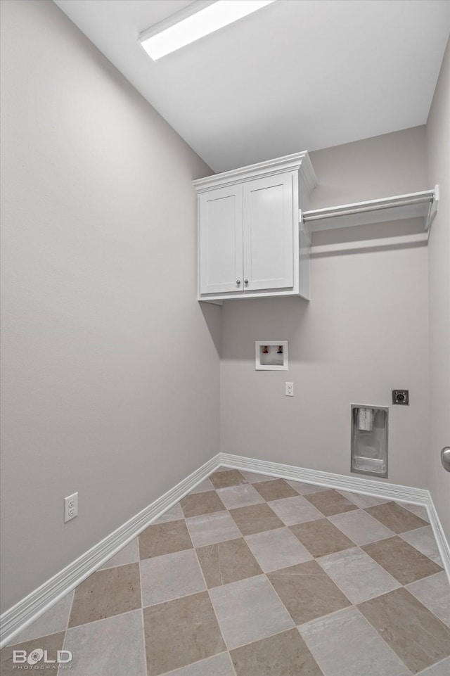 clothes washing area featuring washer hookup, cabinets, and hookup for an electric dryer