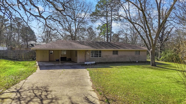 ranch-style home with a carport and a front yard