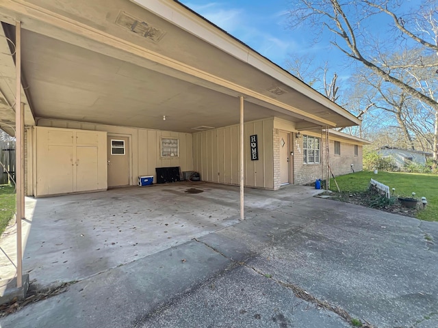 exterior space with a front yard and a carport