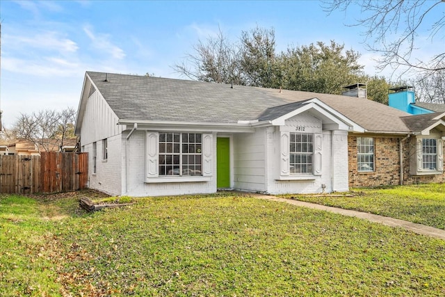 single story home featuring a front yard