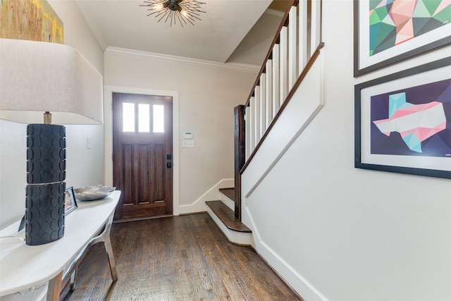 entrance foyer with crown molding and dark hardwood / wood-style floors