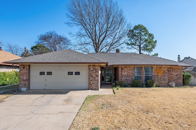 single story home featuring a garage and a front yard