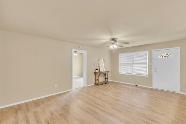 unfurnished room featuring ceiling fan and light hardwood / wood-style floors