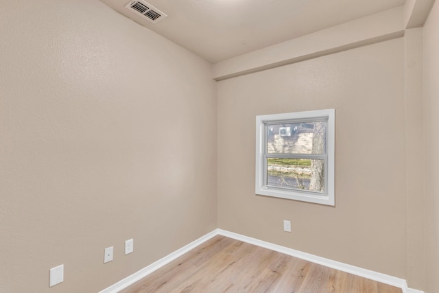 empty room featuring light hardwood / wood-style floors