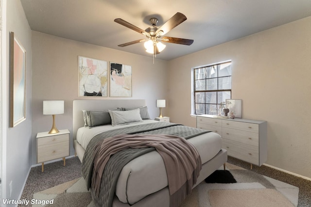 carpeted bedroom with ceiling fan