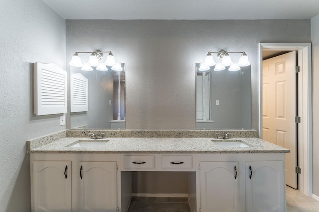 bathroom featuring vanity and tile patterned floors