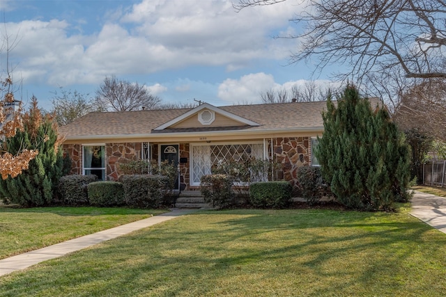 ranch-style house with a front yard