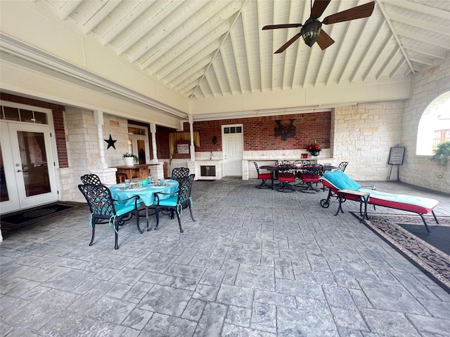 view of patio with french doors and ceiling fan