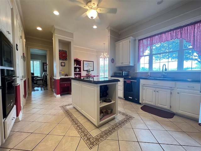 kitchen featuring sink, white cabinets, a center island, light tile patterned floors, and black appliances