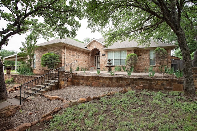 single story home featuring a patio