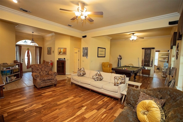 living room with hardwood / wood-style flooring, billiards, and ceiling fan