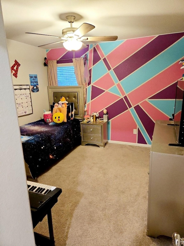 bedroom with ceiling fan and carpet flooring