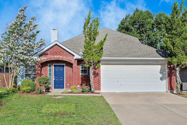 view of front property with a garage, a front yard, and central air condition unit