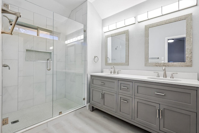 bathroom featuring vanity and walk in shower