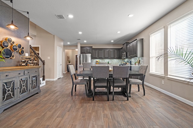 dining room featuring dark hardwood / wood-style flooring