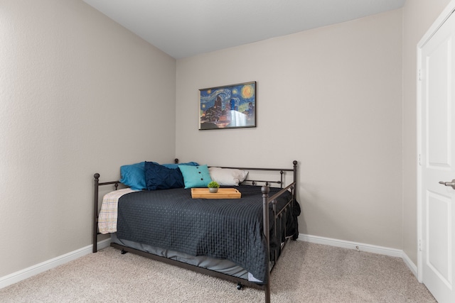 bedroom featuring carpet flooring