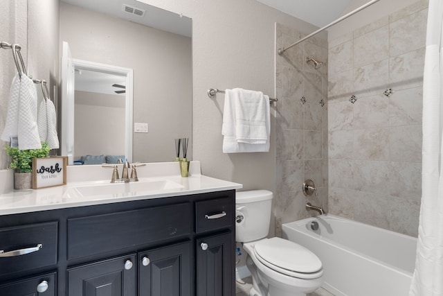 full bathroom with vanity, toilet, and shower / bath combo with shower curtain