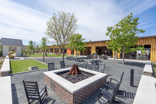 view of patio / terrace with a fire pit