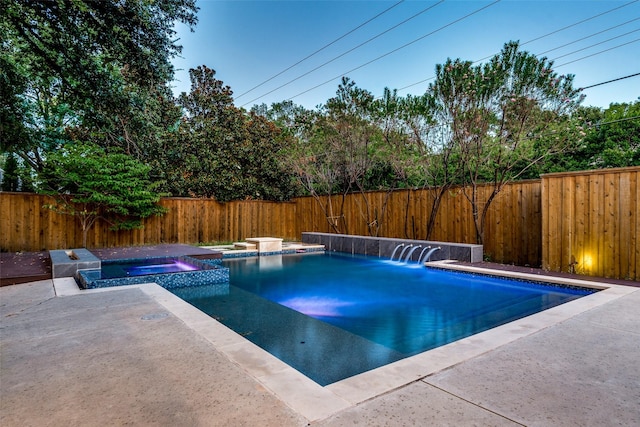 view of pool featuring an in ground hot tub and a patio