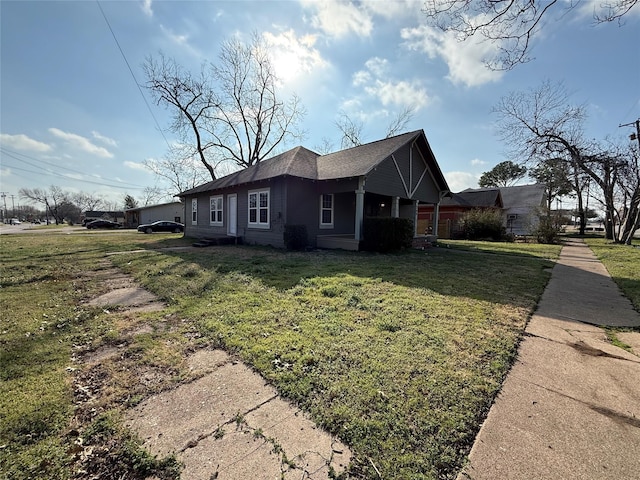 view of home's exterior with a yard