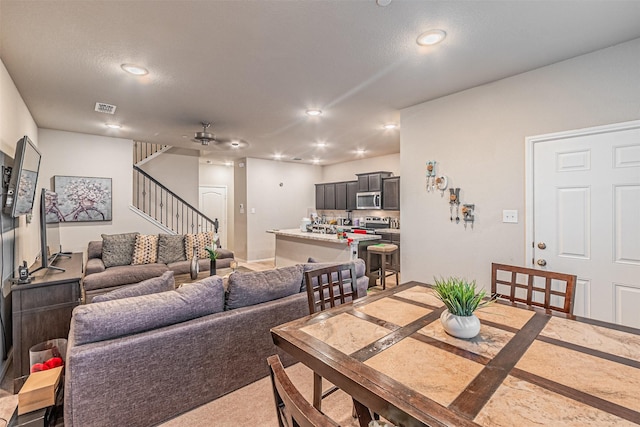 dining area with ceiling fan