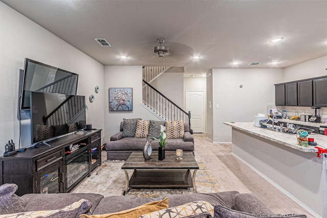 living room with light carpet