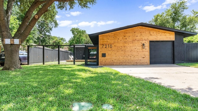 exterior space featuring an outbuilding and a garage