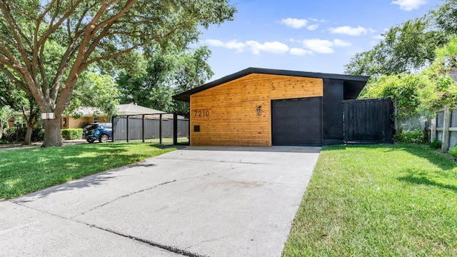 garage featuring a yard