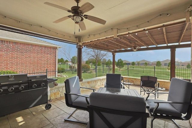 view of patio with ceiling fan