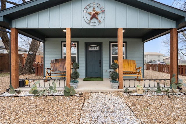 entrance to property with a porch