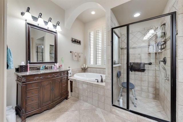 bathroom with vanity, separate shower and tub, and tile patterned flooring