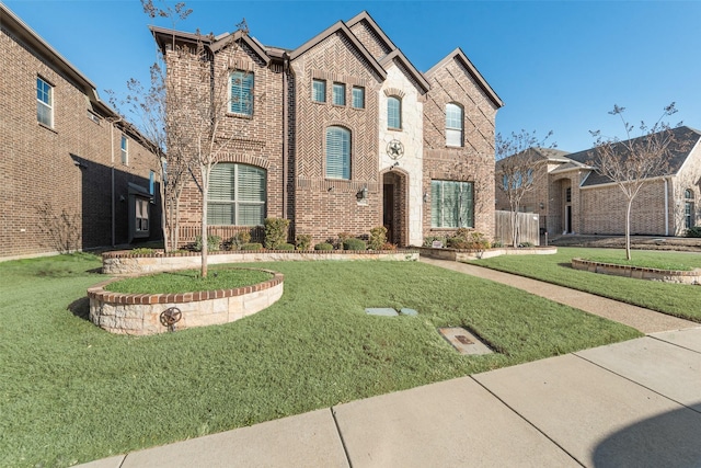 view of front of home with a front yard