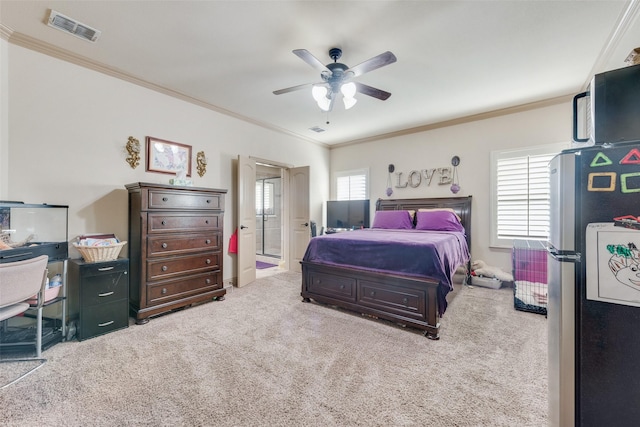 carpeted bedroom featuring ornamental molding, stainless steel fridge, and multiple windows