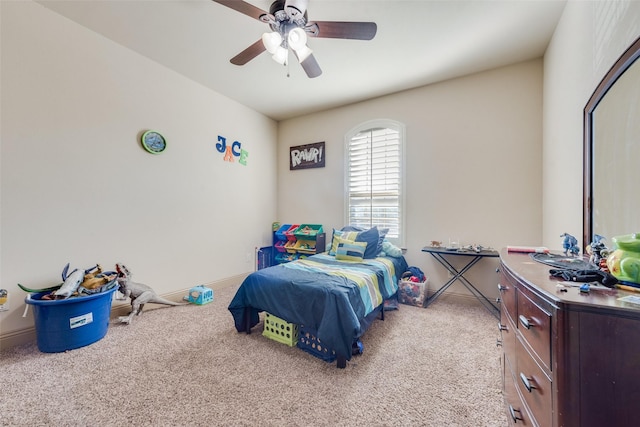 bedroom with ceiling fan and light colored carpet