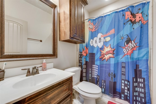 bathroom featuring a shower with curtain, vanity, and toilet